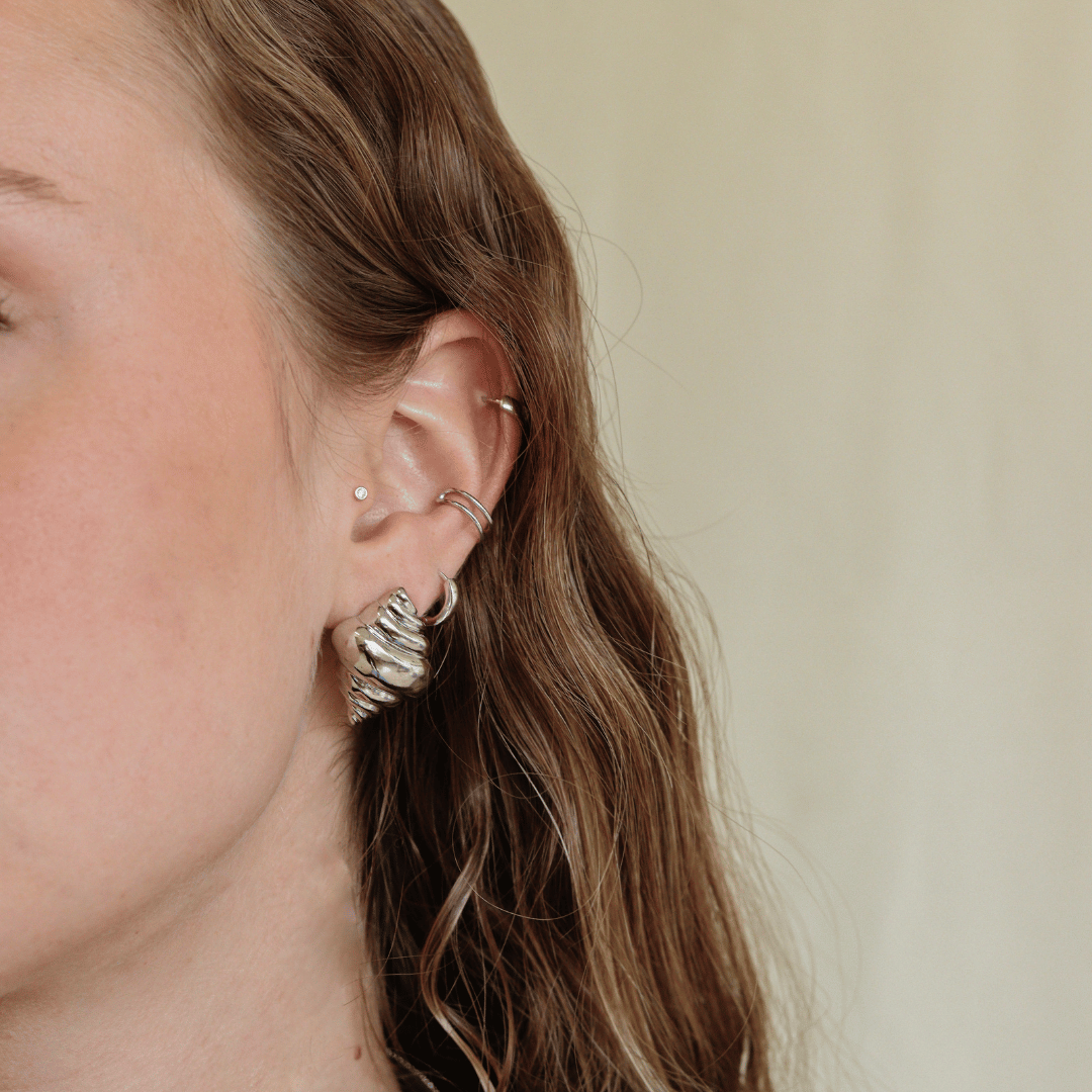 ARETES CARACOL PLATEADOS